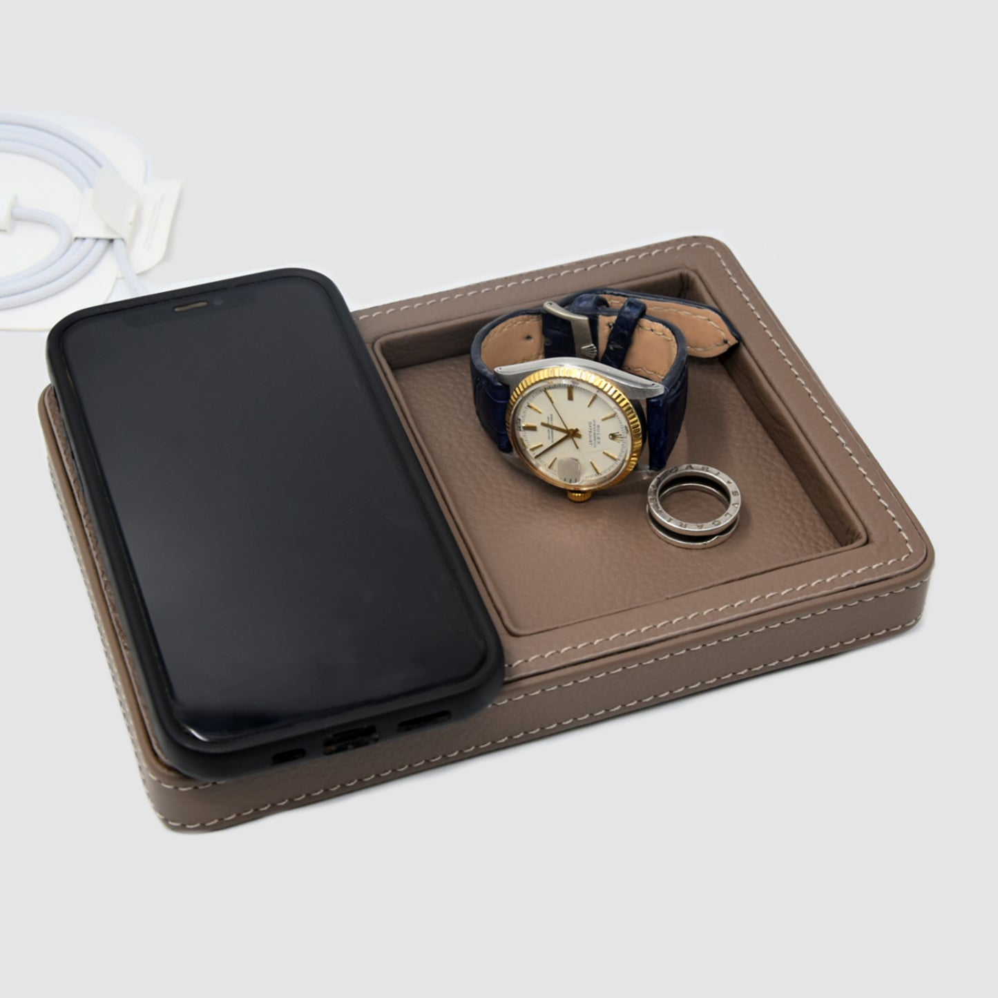 Svuotatasche e caricabatterie Magsafe per iPhone